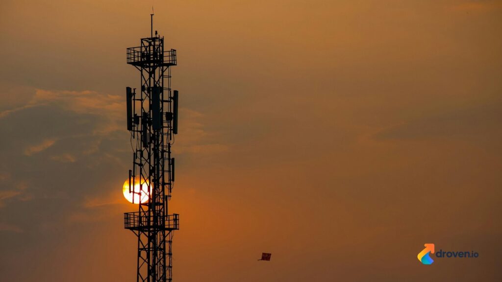 Engineers developing and testing wireless communication antennas at a modern manufacturing facility