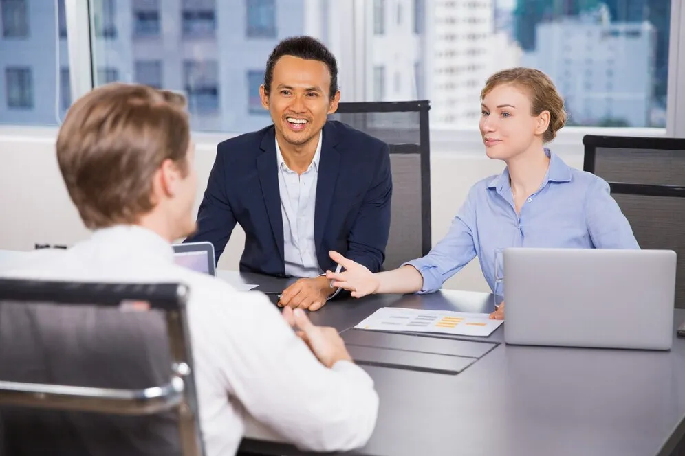 IT professionals discussing contract hiring and workforce planning